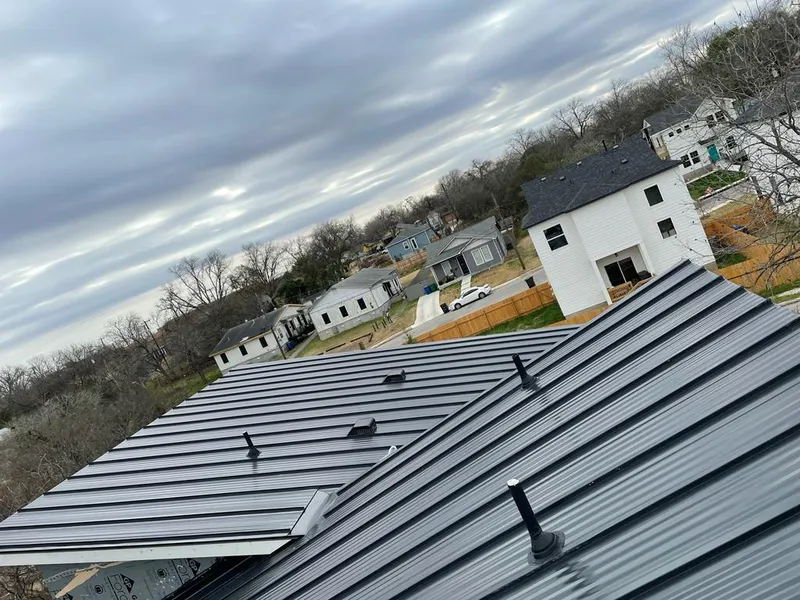 Standing seam metal roof panels with vents for Skylight Repair in Woodstock